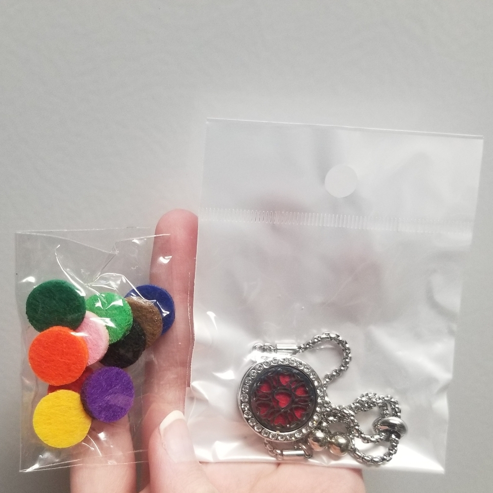 NWT diffuser bracelet with 10 pads
